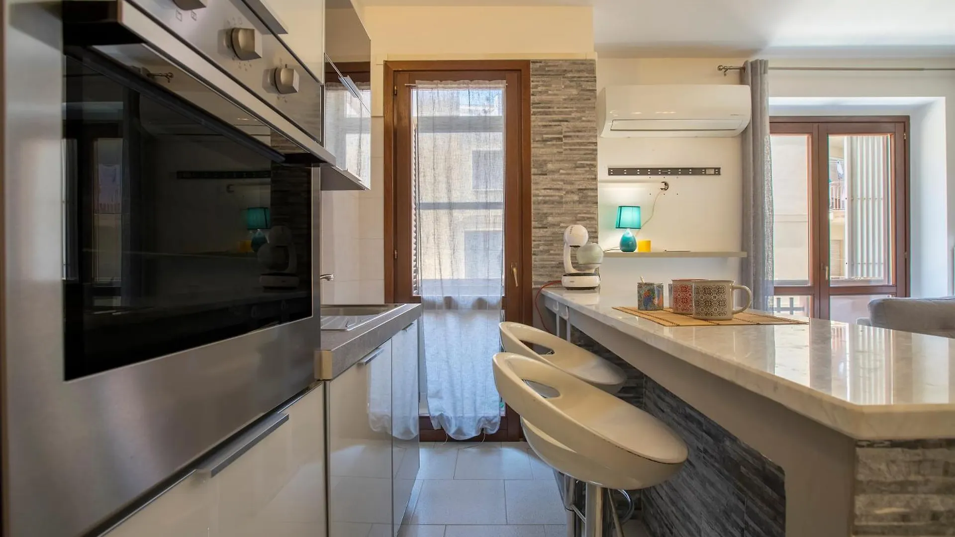 Clhome In The Heart Of Альгеро Апартаменты